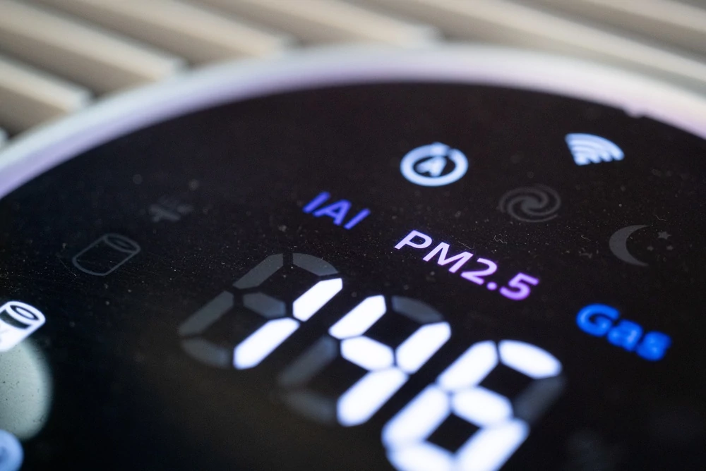 Close-up of a digital air quality monitor
